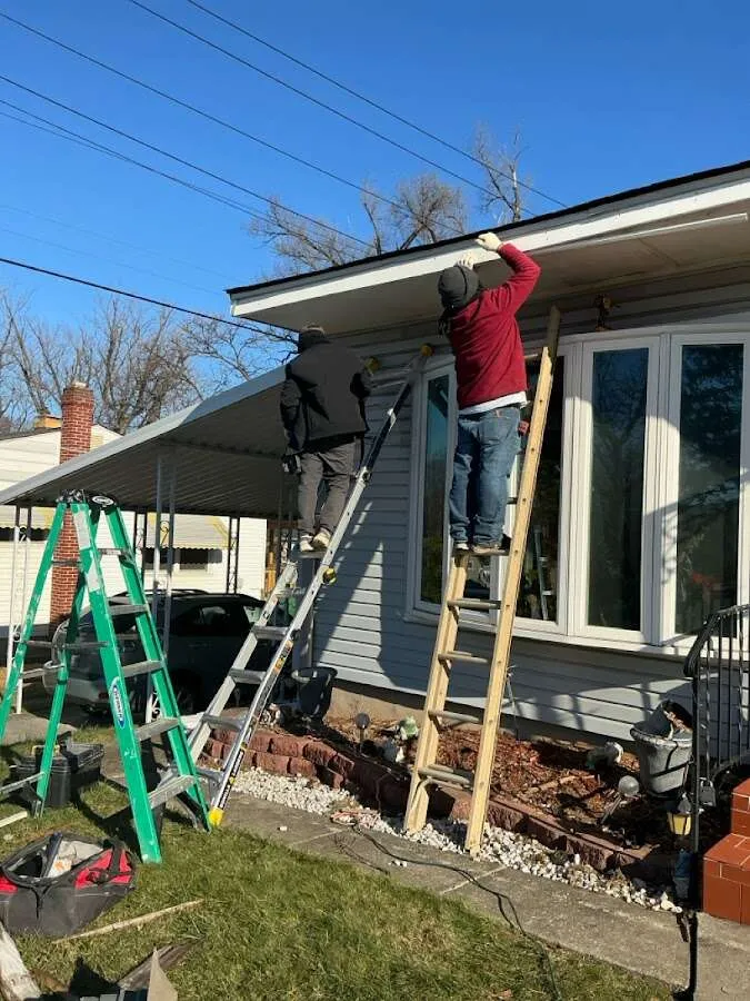 Restoration crew performing exterior repair in Locust Grove